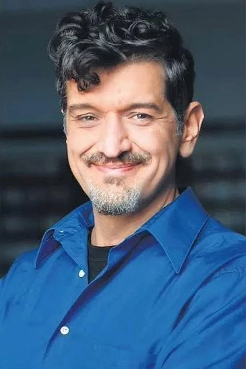 Енріко Касароса